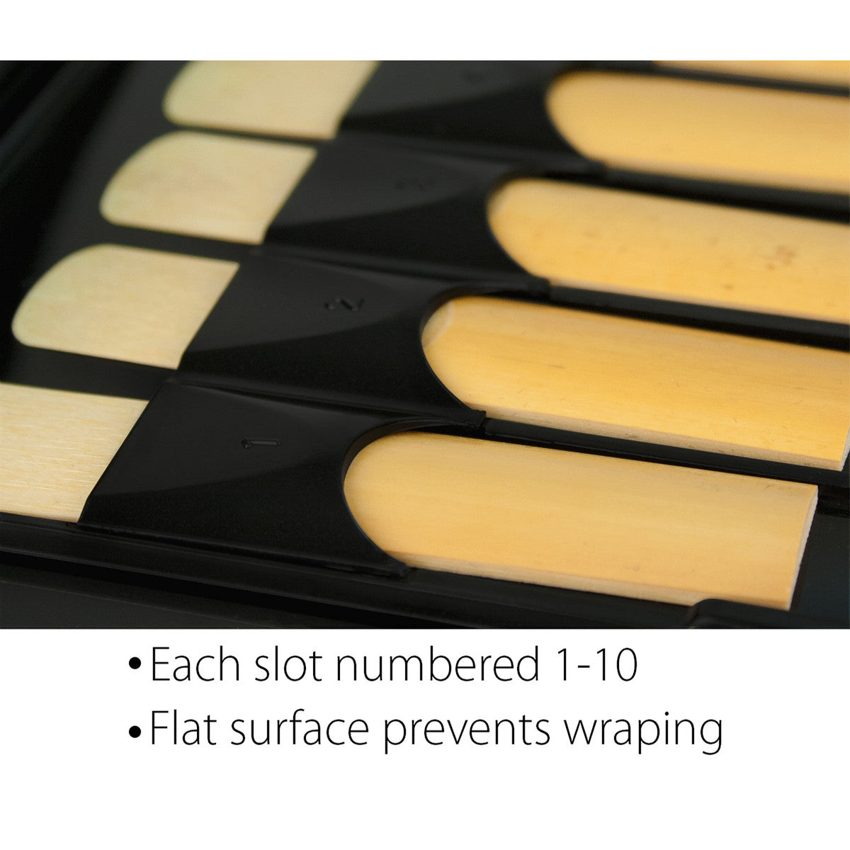 closeup of case with reeds inserted; bulleted text at bottom reads: "Each slot numbered 1-10" and "Flat surface prevents warping"