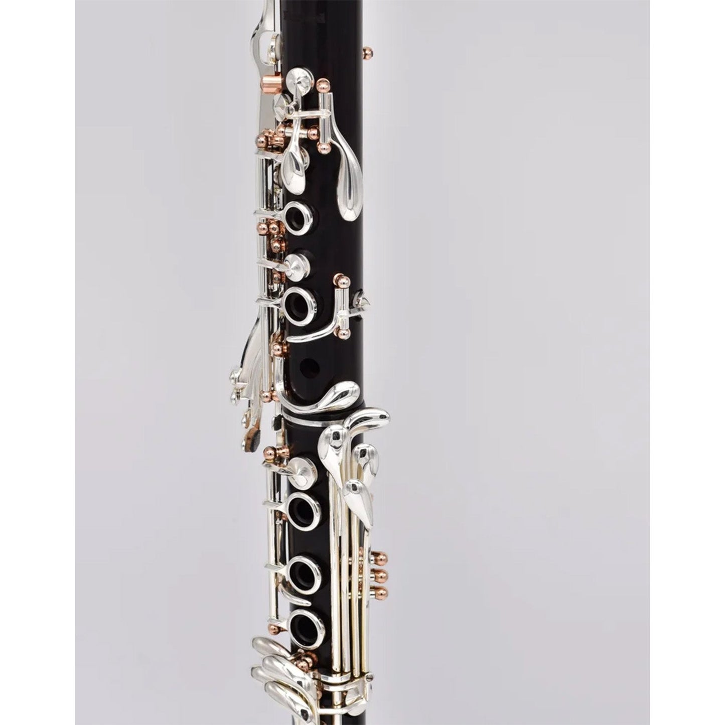 detail shot of the upper and lower joint keywork, highlighting the rose gold posts
