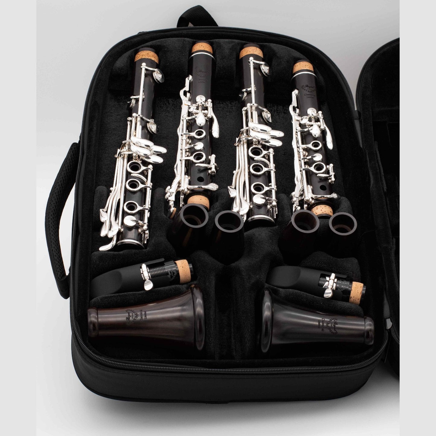 Pair of Royal Global Classical Limited Bb and A clarinets, disassembled in case, case open showing layout