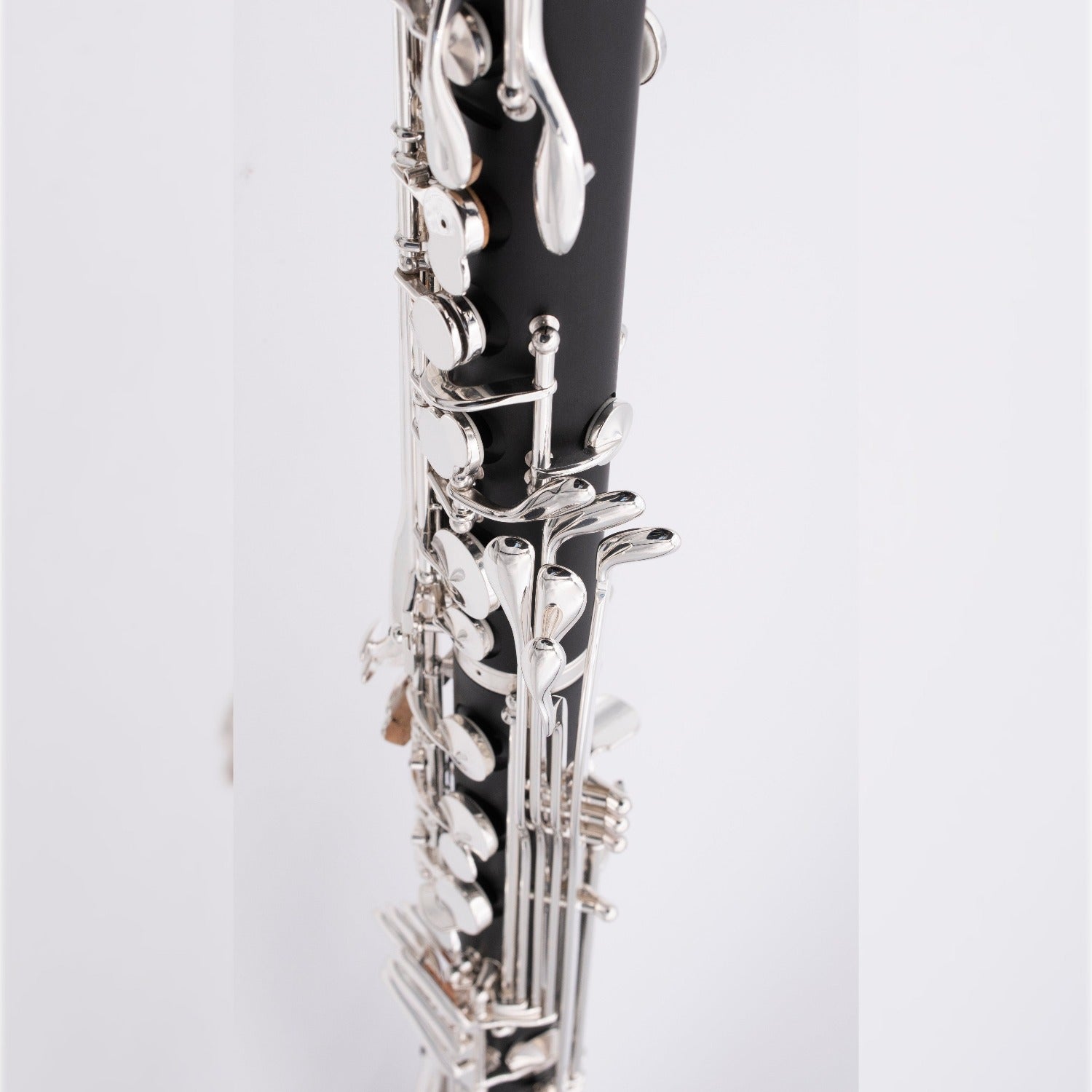 closeup of left pinky key cluster and upper joint keywork