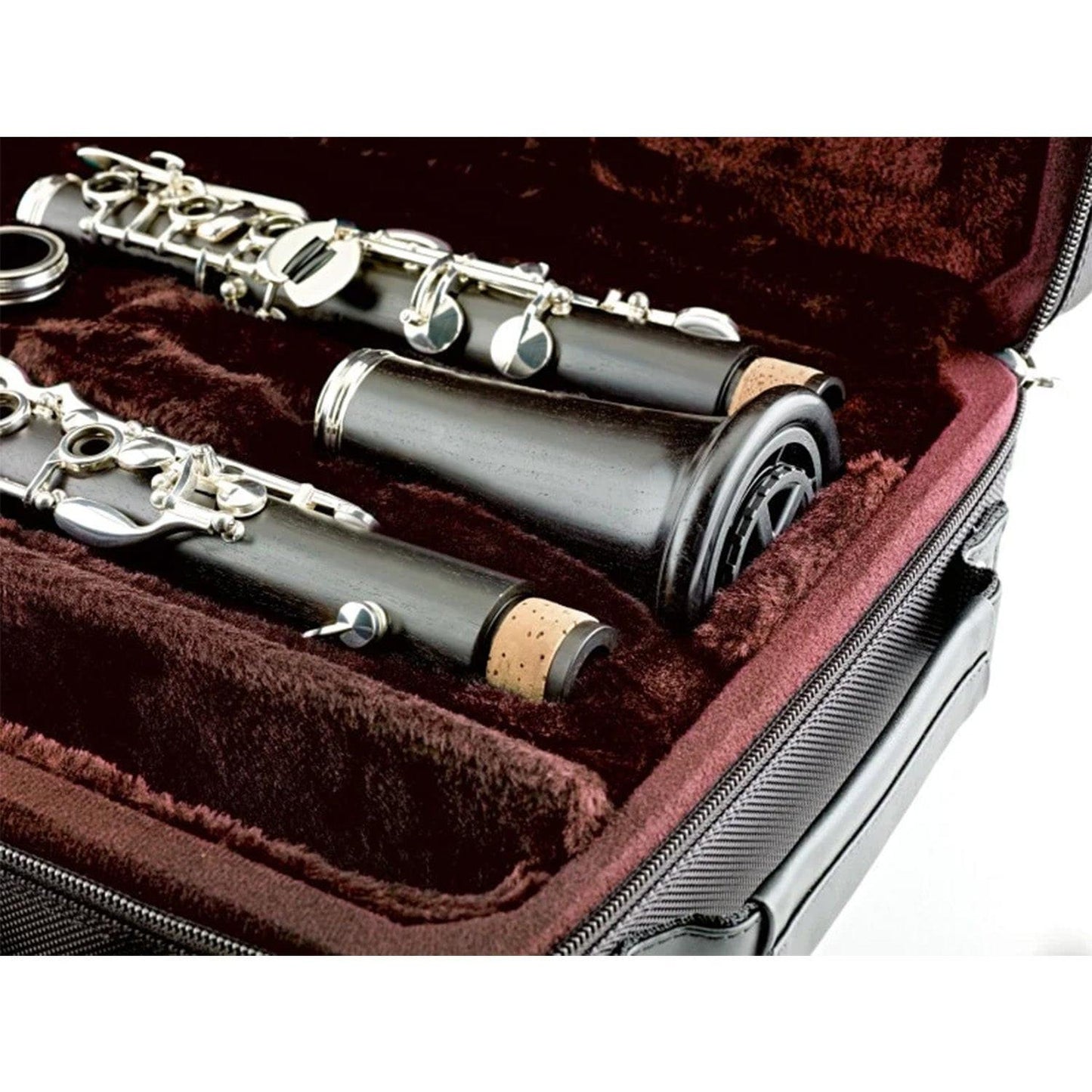 stand stored inside clarinet bell, shown inside clarinet case