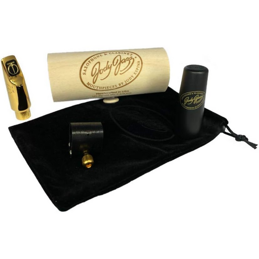 Jody Jazz DV alto sax mouthpiece with wooden tube packaging, ligature, cap, and black velvet pouch on white background