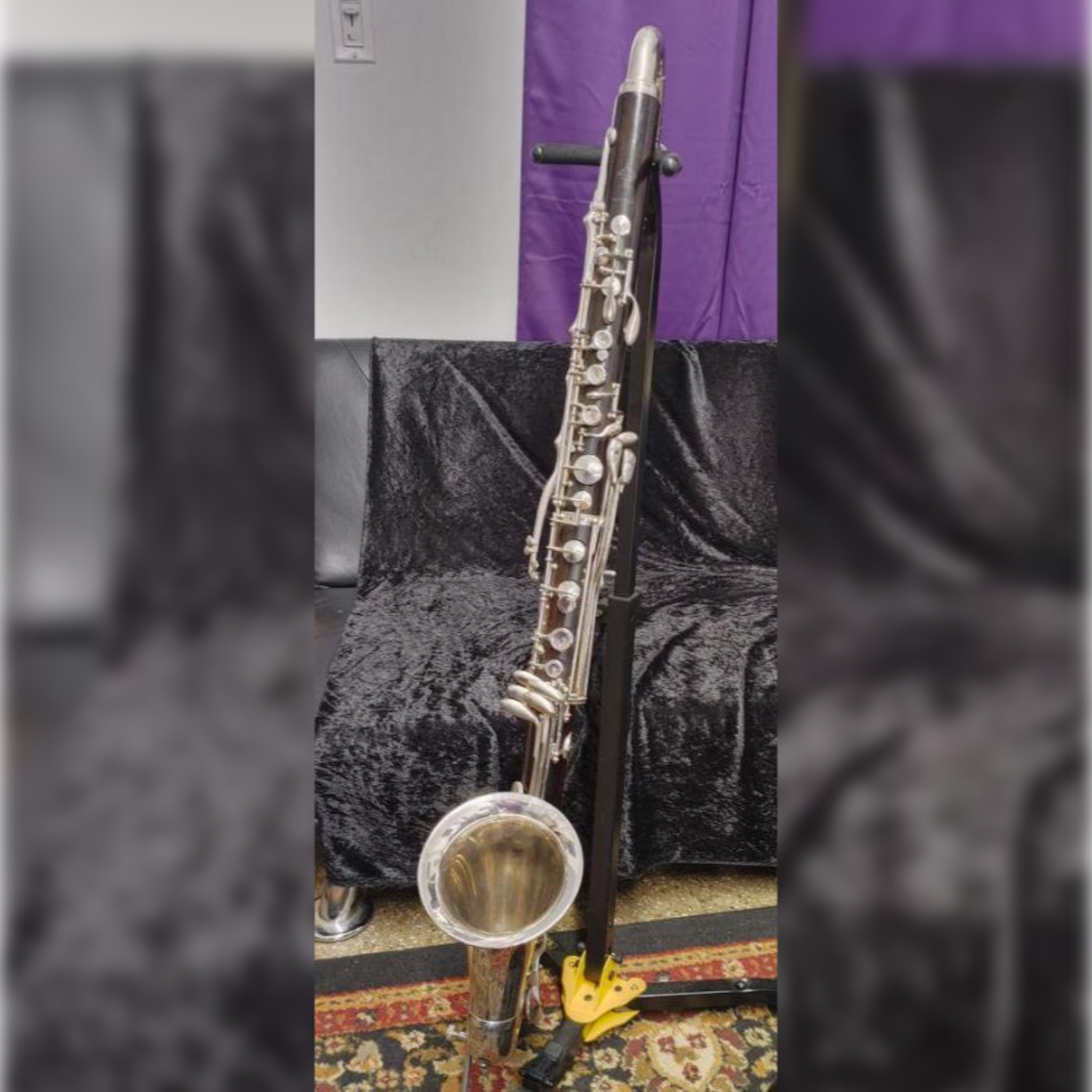 entire bass clarinet assembled in a stand