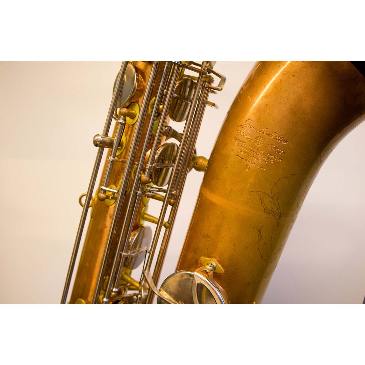 JL Woodwinds Baritone Saxophone Closeup of Logo