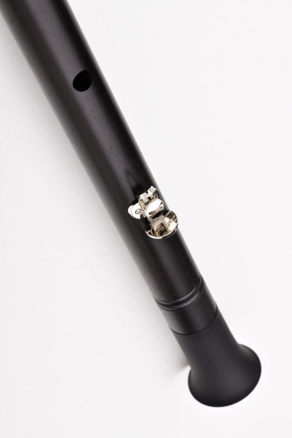 rear view of pocket clarinet showing thumbrest and thumb hole