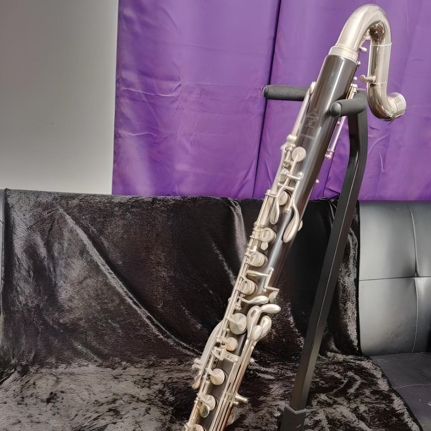 bass clarinet assembled on a stand, closeup of upper half
