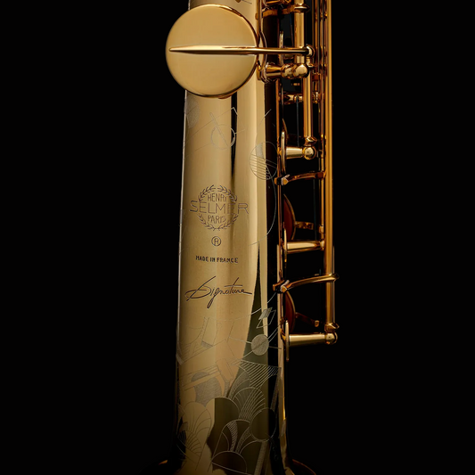Selmer Paris Signature Soprano on black background - bell logo and engraving closeup
