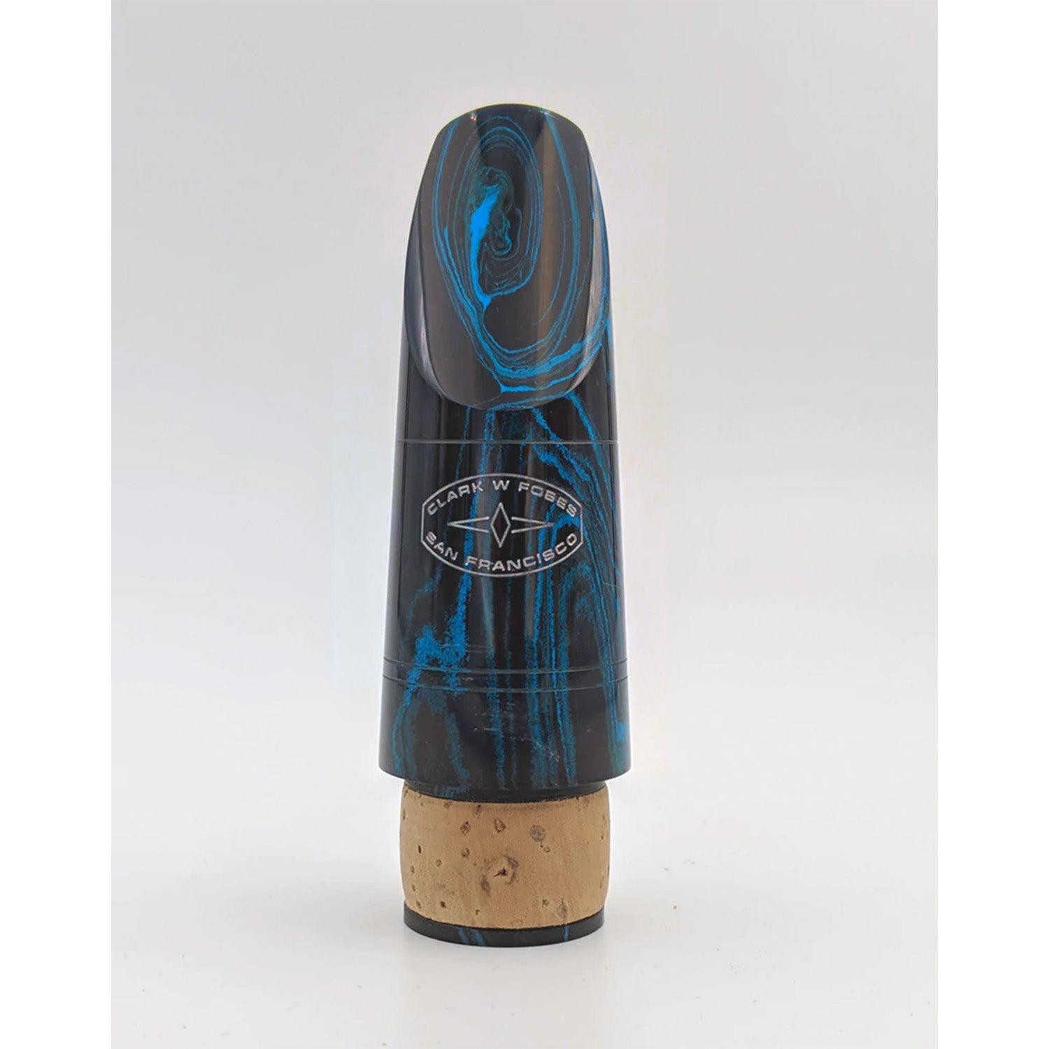 Photo of blue marbled Fobes 10k Bb mouthpiece on light gray background