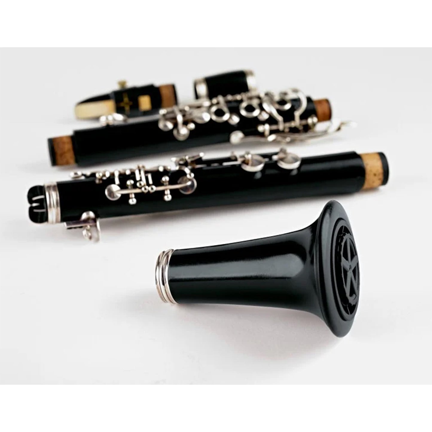 disassembled clarinet, with the disassembled stand inside the bell, showing how it's stored